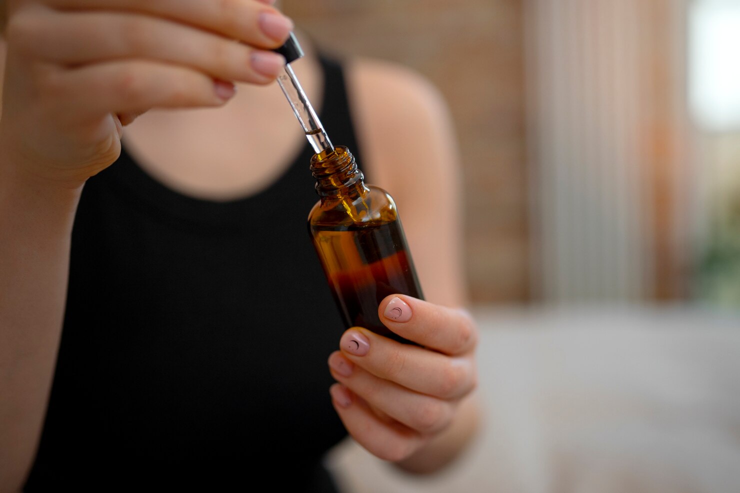 front-view-woman-holding-serum-bottle_23-2150180377